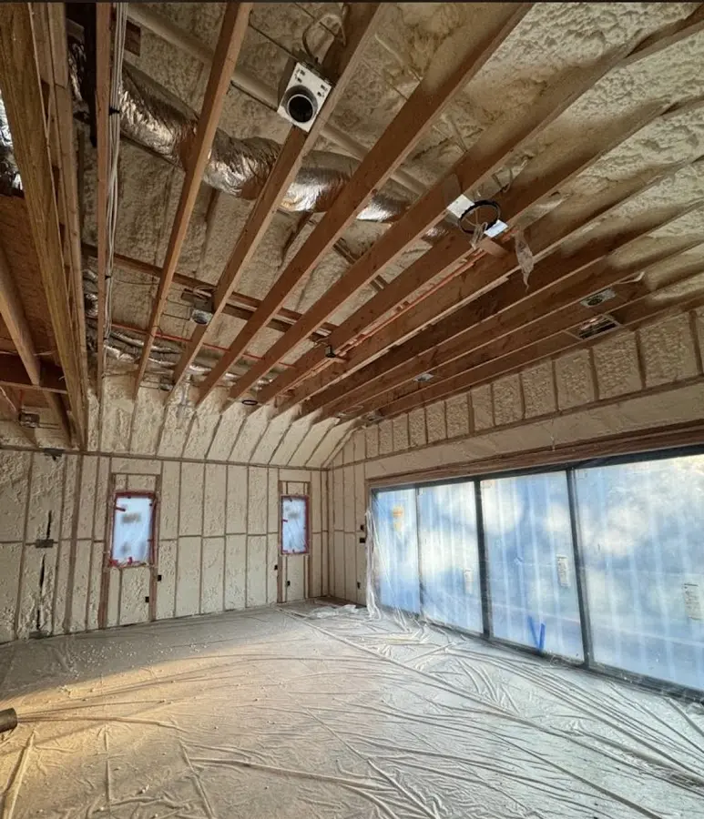 Interior walls and ceiling insulated with spray foam during new construction in Nellis AFB
